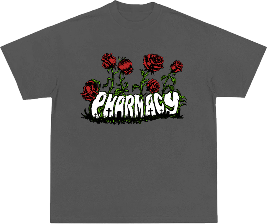 A dark gray short-sleeve t-shirt with a graphic on the chest featuring red roses and the word 'PHARMACY' in a white, distressed font over a black grass-like base.